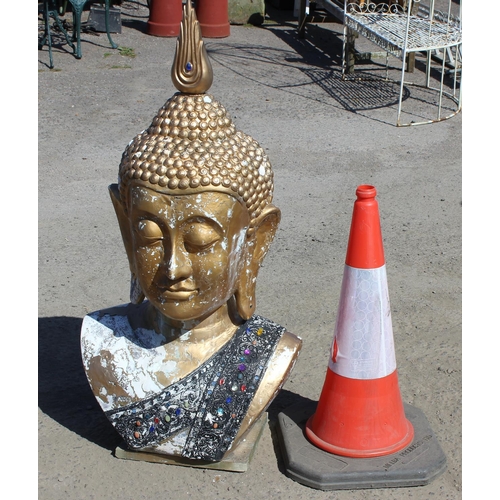310 - A large gilt painted figure of a Buddhistic deity head