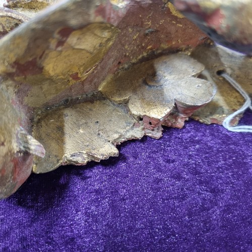 283 - Antique gilt limewood carving of a bird amongst foliage, likely 19th century