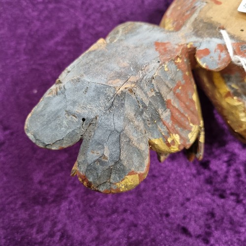 283 - Antique gilt limewood carving of a bird amongst foliage, likely 19th century
