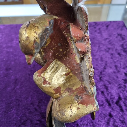 283 - Antique gilt limewood carving of a bird amongst foliage, likely 19th century
