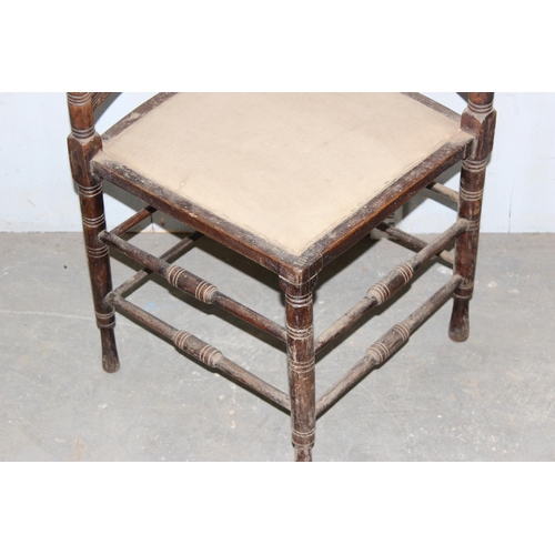 100 - Antique wooden corner chair with turned back and supports