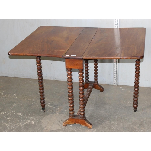 114 - An antique Sutherland table on unusual bobbin turned legs