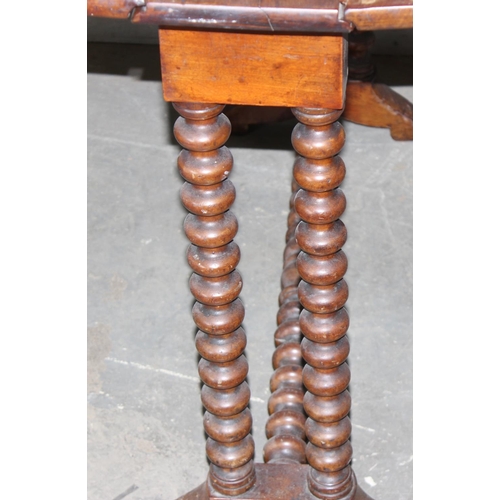 114 - An antique Sutherland table on unusual bobbin turned legs