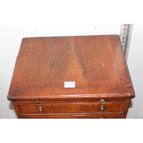 118 - A small antique 7 drawer collectors chest with wooden slide