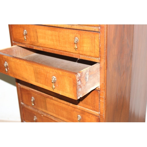 118 - A small antique 7 drawer collectors chest with wooden slide