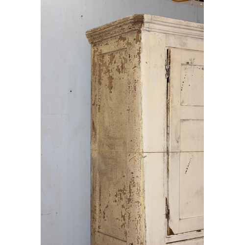 19 - A large Victorian white painted pine cupboard with 2 central drawers, approx 86