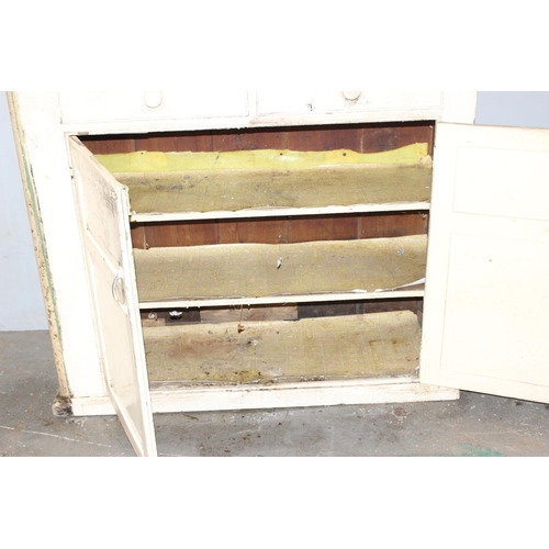 19 - A large Victorian white painted pine cupboard with 2 central drawers, approx 86