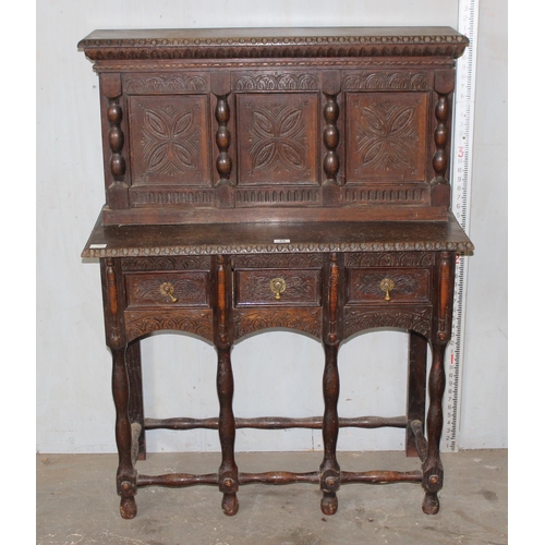 25 - An early 20th century unusual Jacobean style small size cupboard or buffet stand with 3 small drawer... 