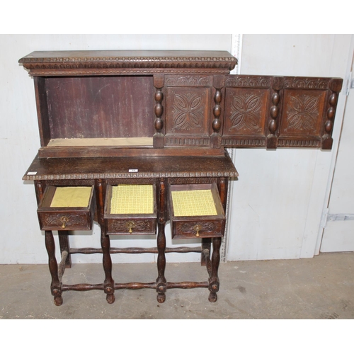 25 - An early 20th century unusual Jacobean style small size cupboard or buffet stand with 3 small drawer... 