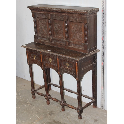 25 - An early 20th century unusual Jacobean style small size cupboard or buffet stand with 3 small drawer... 