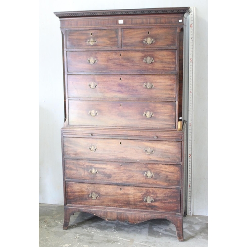 28 - A large Georgian mahogany tall boy or chest on chest, standing on bracket feet with brass fittings