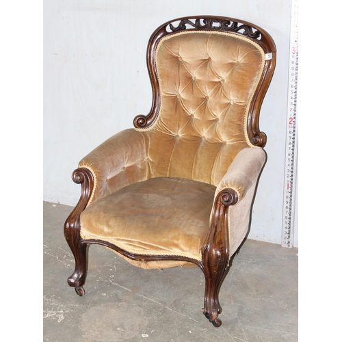 53 - Victorian mahogany framed button back chair with carved details