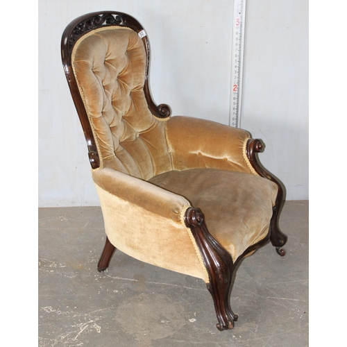 53 - Victorian mahogany framed button back chair with carved details