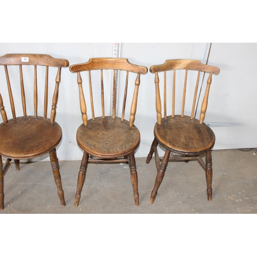 60 - A set of 4 stickback chairs with round elm seats