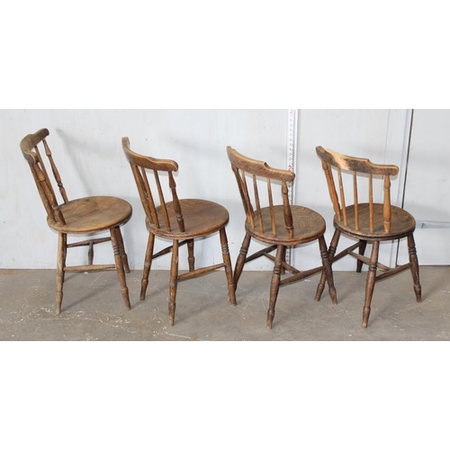 60 - A set of 4 stickback chairs with round elm seats