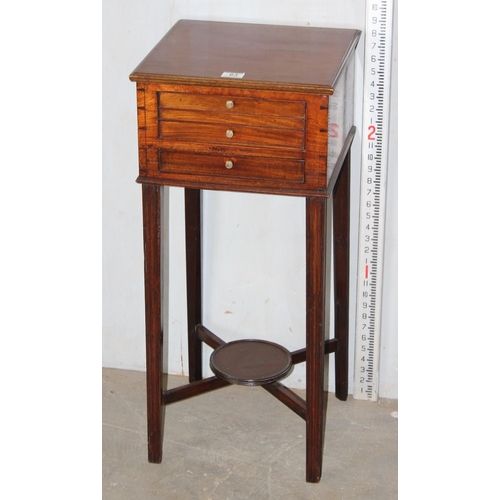 63 - An antique mahogany stand with 2 small drawers