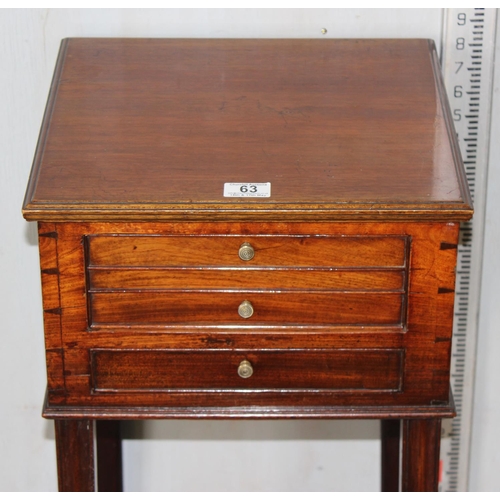 63 - An antique mahogany stand with 2 small drawers