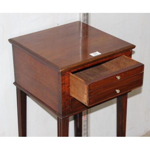 63 - An antique mahogany stand with 2 small drawers