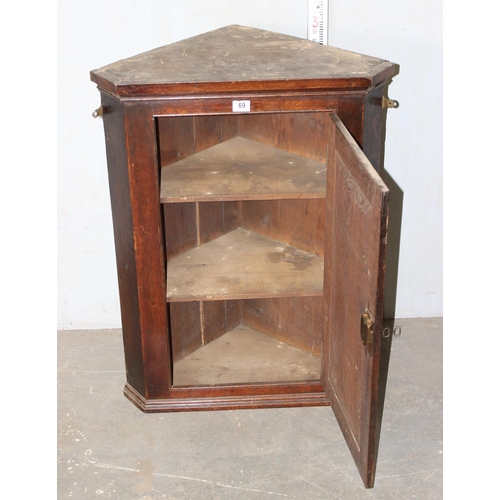 69 - Antique oak corner cupboard