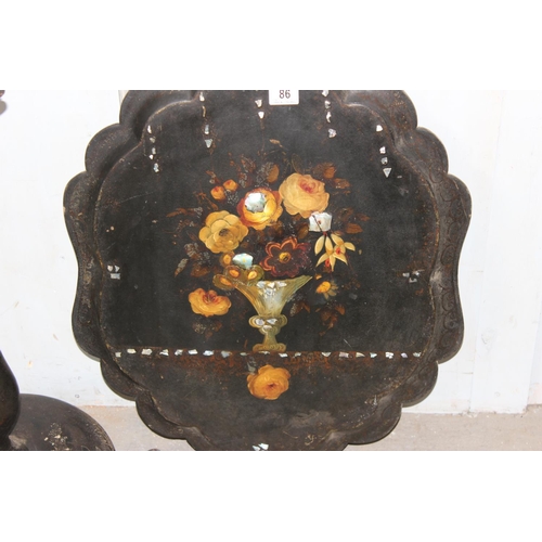 86 - An antique papier mache tilt topped table with painted and inlaid decoration