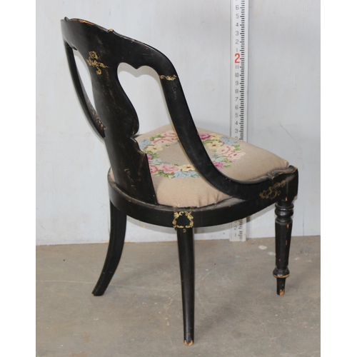 87 - A Victorian black papier mache chair with pierced back splat, drop in upholstered tapestry, decorate... 