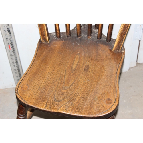 98 - A pair of Elm seated hoop back kitchen chairs