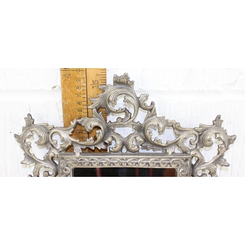 443 - Ornate silver plate on brass cast metal wall mirror in Rococco acanthus leaf style approx 40cm x 29c... 