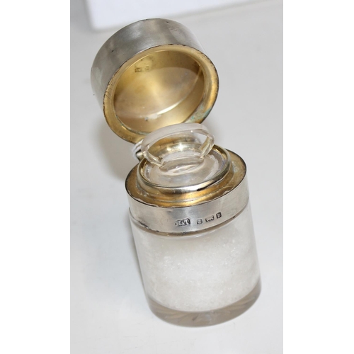 1107 - 2 silver topped dressing table jars