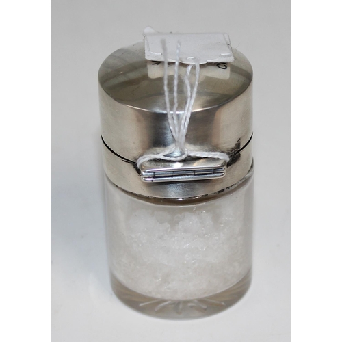 1107 - 2 silver topped dressing table jars