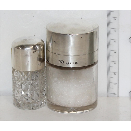 1107 - 2 silver topped dressing table jars