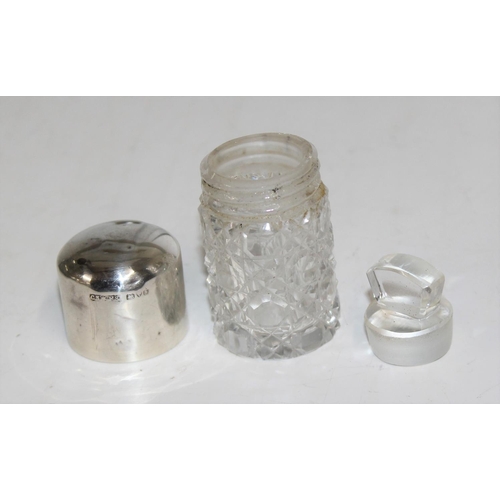 1107 - 2 silver topped dressing table jars