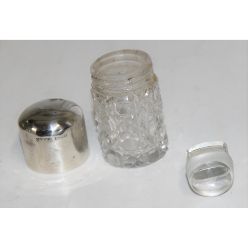 1107 - 2 silver topped dressing table jars