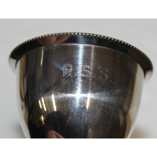 1119 - Silver egg cup and spoon in impressive fitted leather case, Chester 1911 by Stokes & Ireland, approx... 