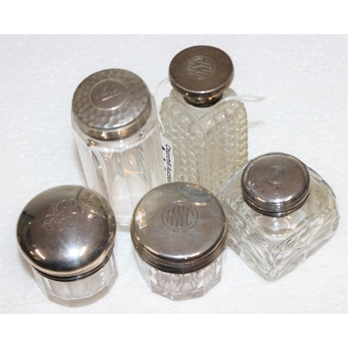 1121 - 5 silver topped dressing table pots & jars, various dates and makers