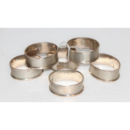 1122 - Set of 6 boxed silver napkin rings, Birmingham 1975 by Broadway & Co, approx 74g gross