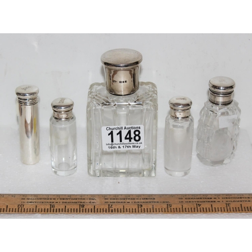 1148 - 5 silver mounted perfume bottles, various dates and makers