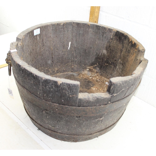 127 - A vintage coopered barrel tub with brass lion handles