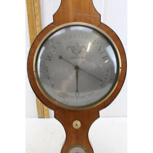 1400 - A 19th century mercury wheel barometer by A. Barnaschina, with silvered dial