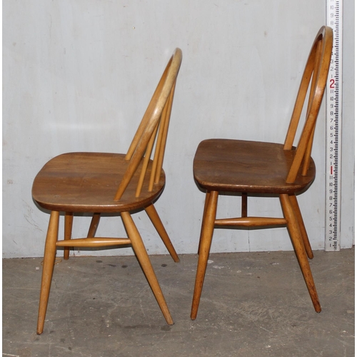 165 - A matched set of 4 blonde Ercol hoop back dining chairs