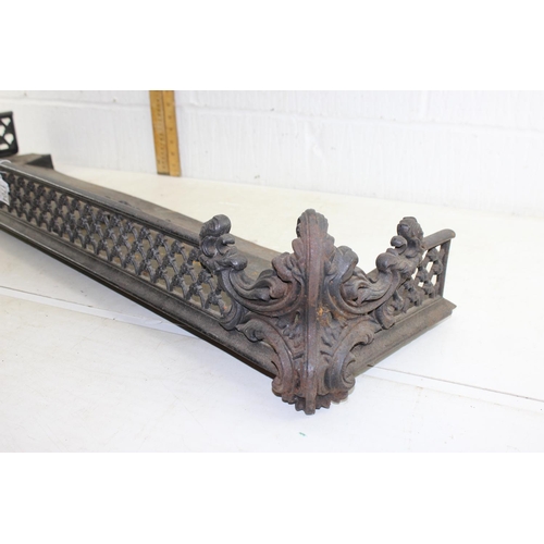 1704 - A large antique cast iron fire fender or fire kerb with Rococo scrolls