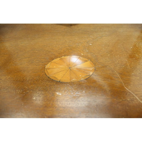 270 - Antique shield shaped table top mirror