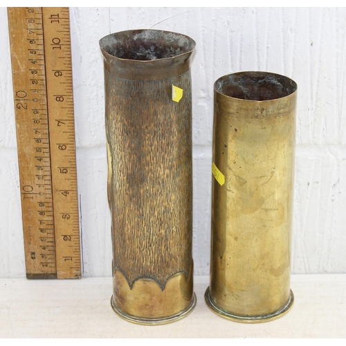 1002 - 2 early 20th century brass shell cases, one with trench art decoration