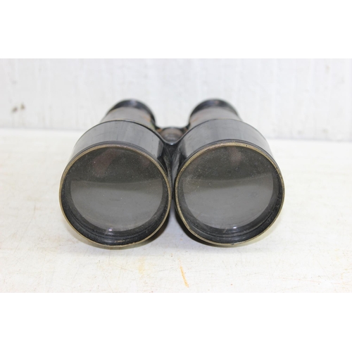 1003 - A pair of C.WW1 period binocular in leather case, possibly officer's private purchase