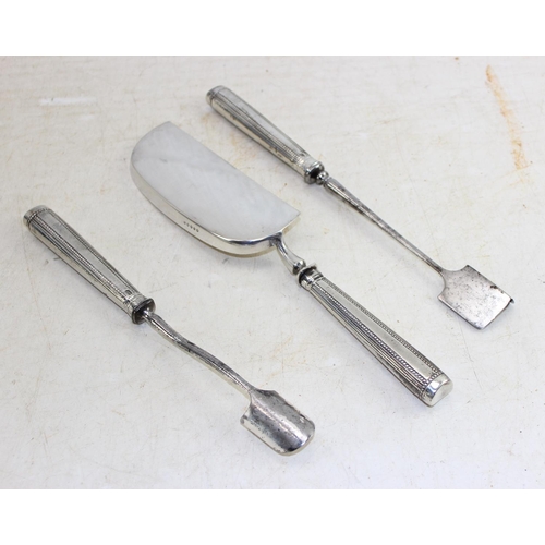 1109 - 2 silver handled cheese scoops and a silver plated crumb scoop in associated box