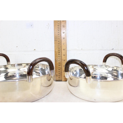 1159 - A graduated set of 3 silver plated bowls with ebonised wooden handles