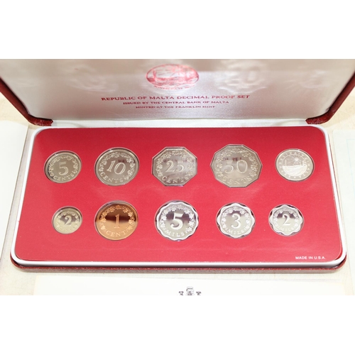 1315 - 1979 Malta decimal proof set in coin in case with paperwork and a Silver £1 coin, also 1979