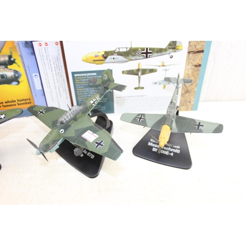 1548 - 4 diecast metal models of WW2 period planes on stands to inc Hurricane, B-17F, Junkers & Messerschmi... 