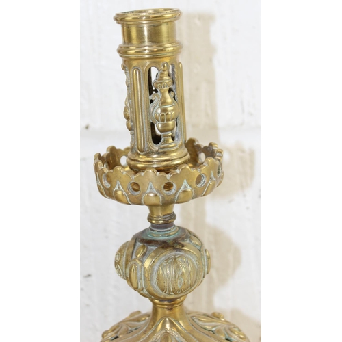 1755 - A pair of decorative brass Gothic Revival type candlesticks