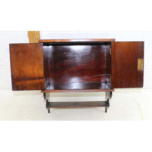 272 - An Edwardian marquetry inlaid wall cabinet