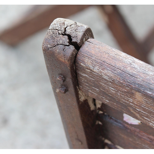 327 - Wooden garden table and 4 chairs